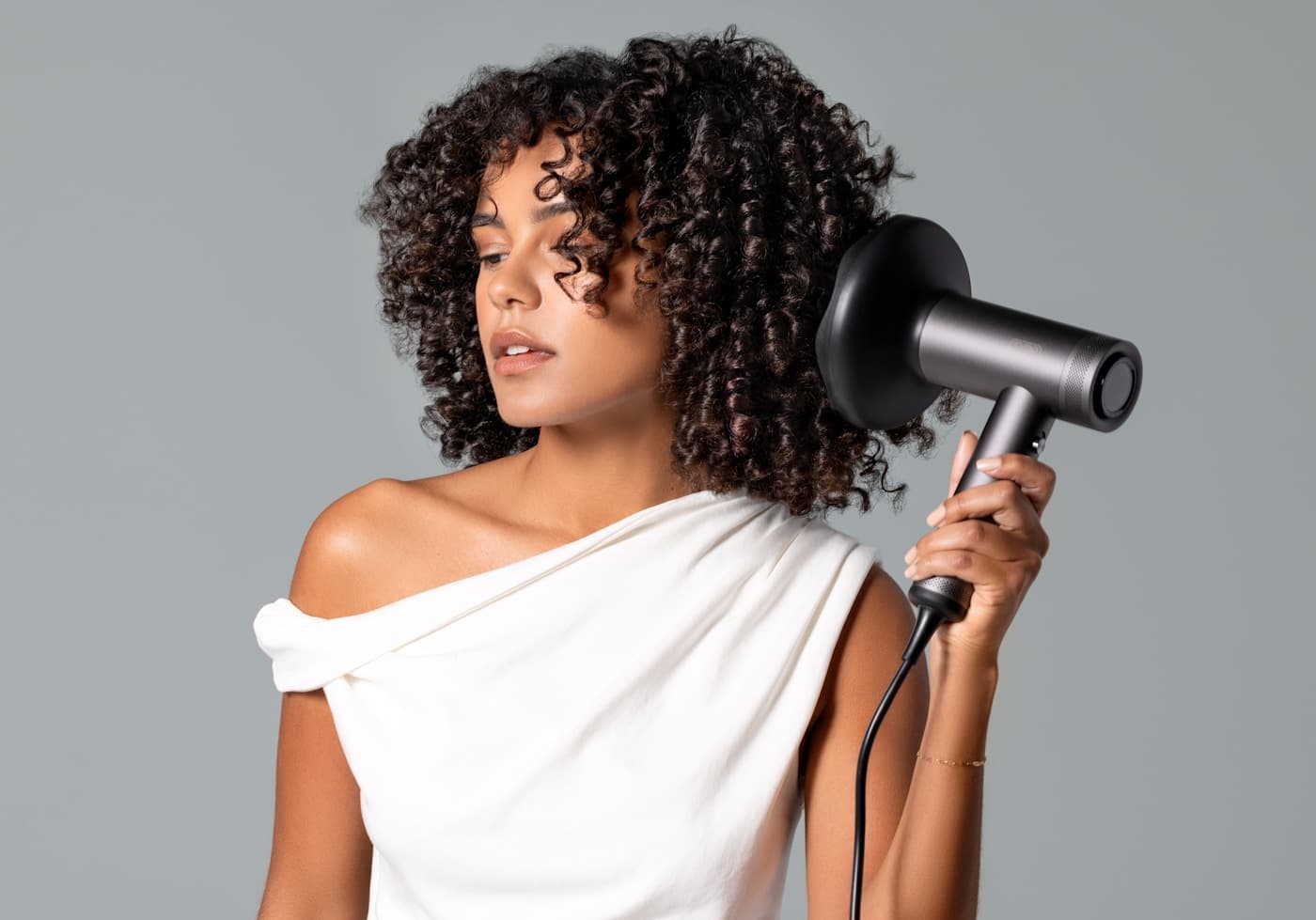 Editorial blow-dry on defined curls